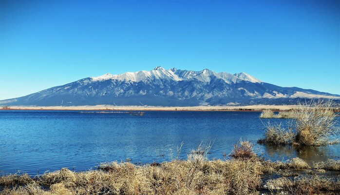 Discover Your Dream Homestead on the Mesa: 5.4 Acres with Breathtaking Mountain Views