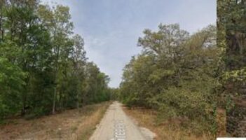 Lot on Greeley St on a Gravel Road.