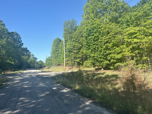 Paved Road Access + WATER & POWER POLE in a GREAT LOCATION!