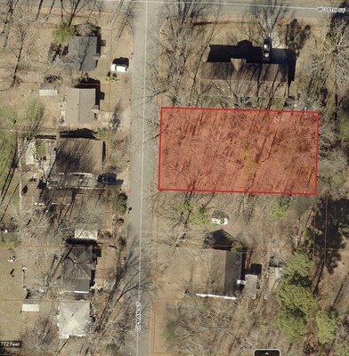 Wooded 0.23 acre lot for sale!